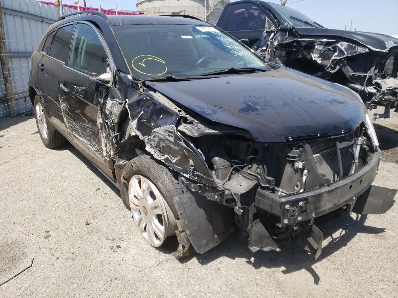 CADILLAC SRX 2012 with VIN 3GYFNGE33CS532857 - Photo from auction