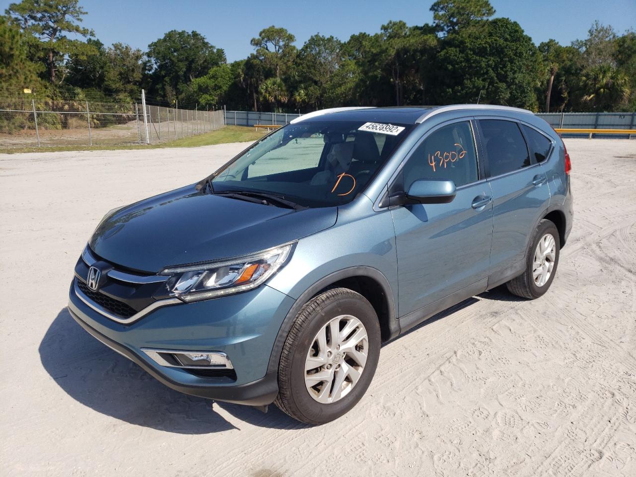 Photo 14 from auction – 2016 HONDA CR-V EXL with VIN 2HKRM4H79GH667621