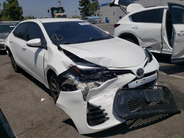 TOYOTA COROLLA L 2017 with VIN 5YFBURHE2HP727188 - Photo from auction