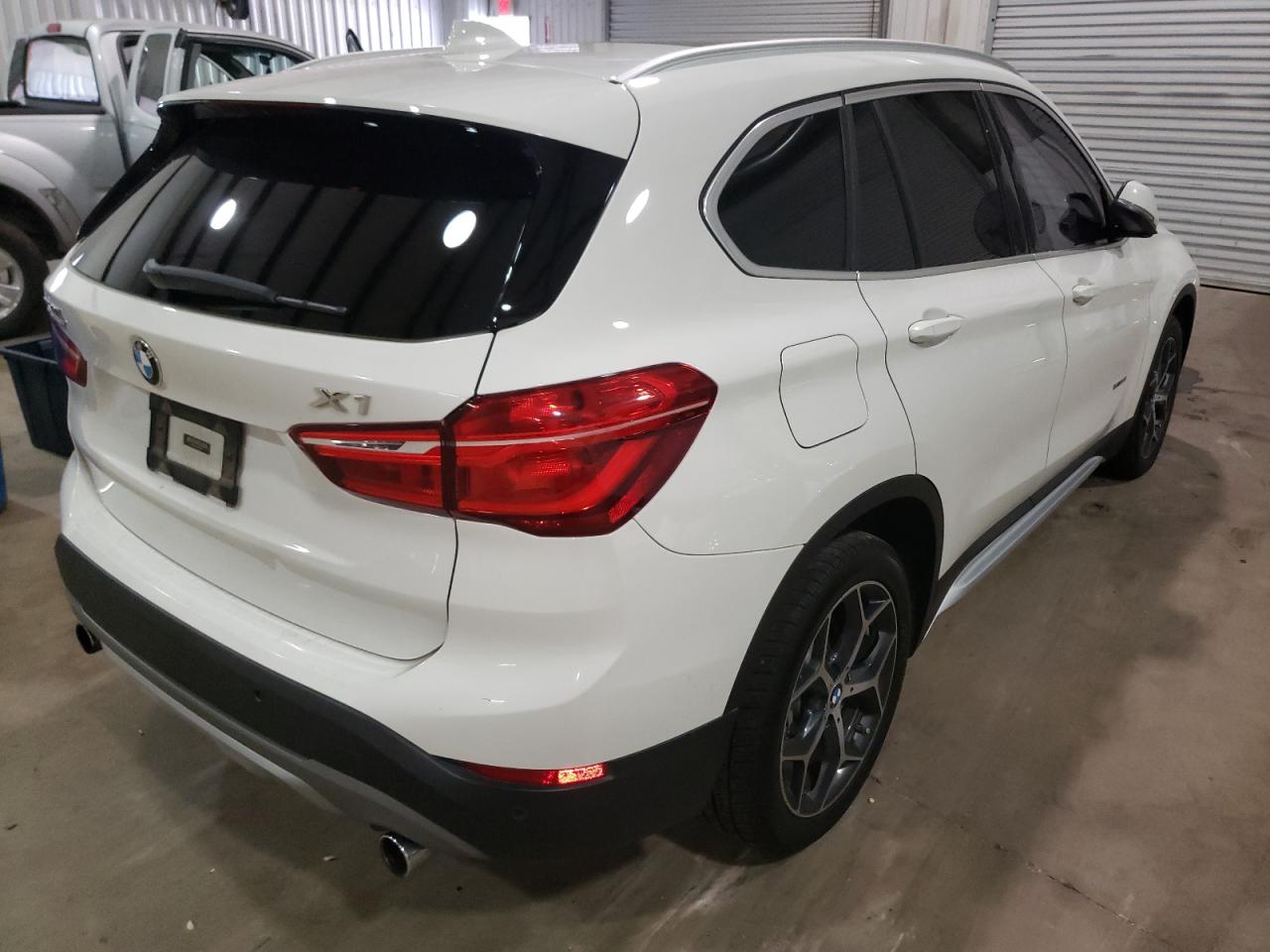 Photo 4 from auction – 2017 BMW X1 XDRIVE2 with VIN WBXHT3C33H5F86327
