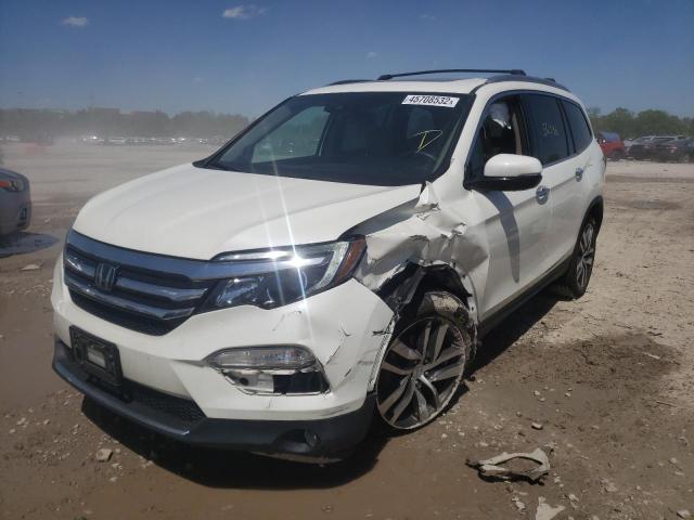 Photo 2 from auction – 2018 HONDA PILOT ELIT with VIN 5FNYF6H02JB014171