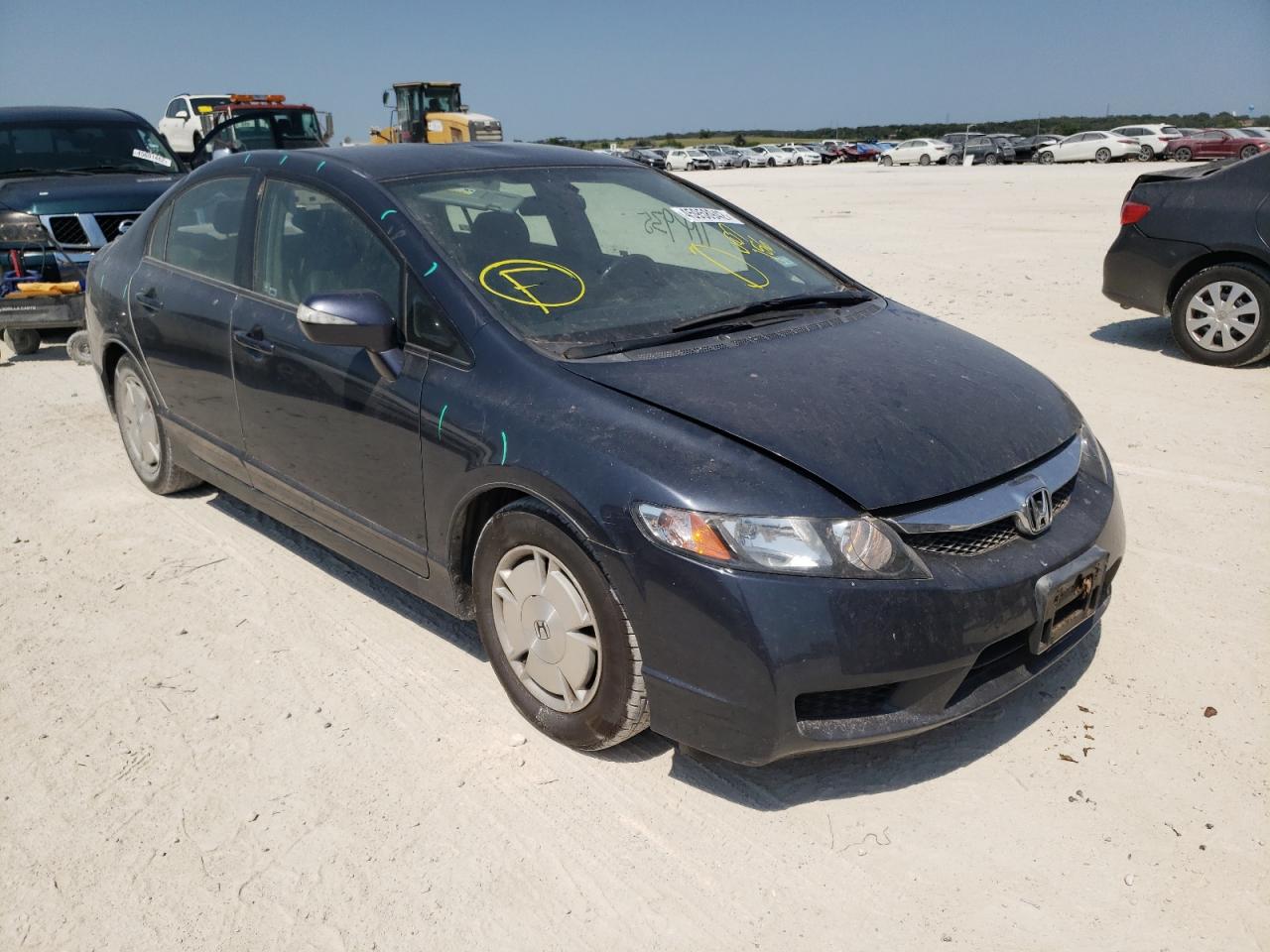 HONDA CIVIC HYBR 2010 with VIN JHMFA3F21AS007156 - Photo from auction