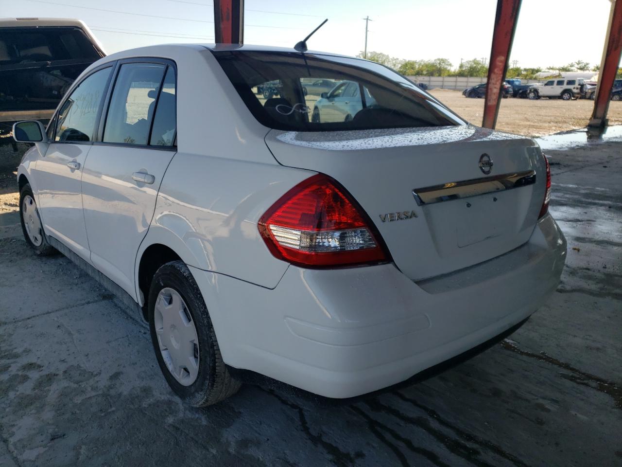 Photo 3 from auction – 2009 NISSAN VERSA S with VIN 3N1BC11E49L463262