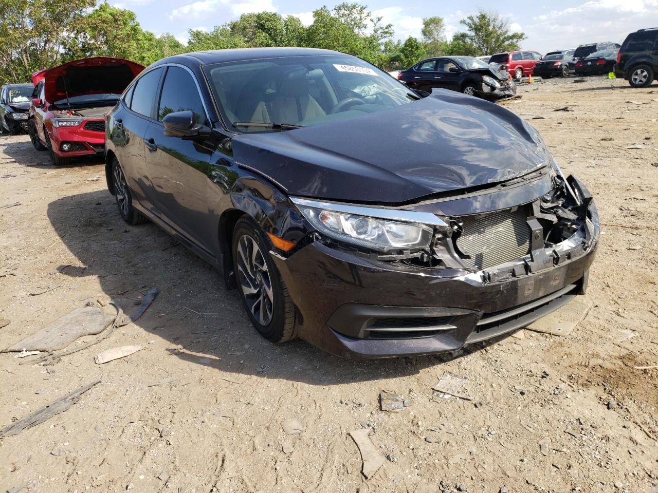 HONDA CIVIC EX 2018 with VIN 2HGFC2F7XJH507715 - Photo from auction