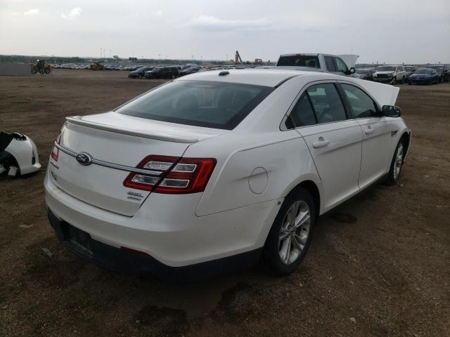 Photo 4 from auction – 2014 FORD TAURUS SEL with VIN 1FAHP2E97EG104474
