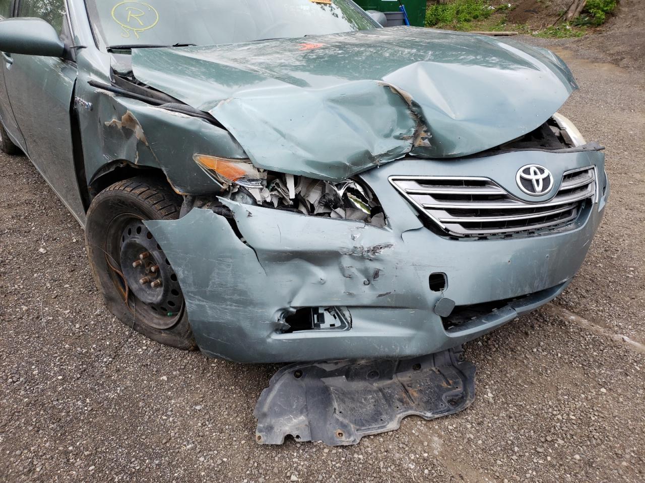 Photo 9 from auction – 2007 TOYOTA CAMRY HYBR with VIN JTNBB46K373015759