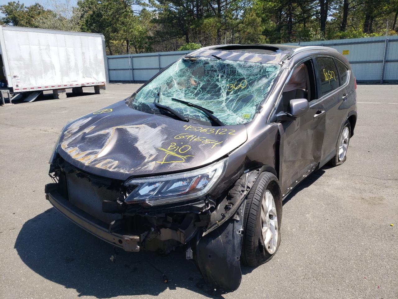 Photo 15 from auction – 2015 HONDA CR-V EXL with VIN 2HKRM4H71FH691684