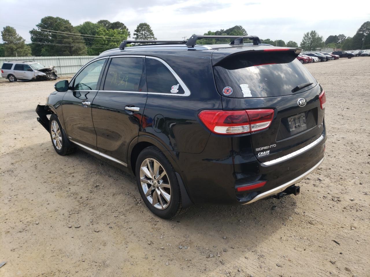 Photo 3 from auction – 2016 KIA SORENTO SX with VIN 5XYPKDA51GG006730