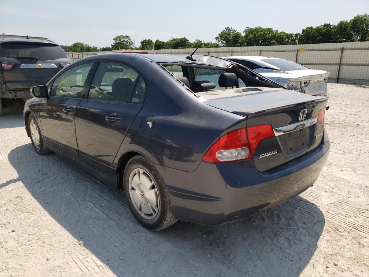 Photo 3 from auction – 2010 HONDA CIVIC HYBR with VIN JHMFA3F21AS007156