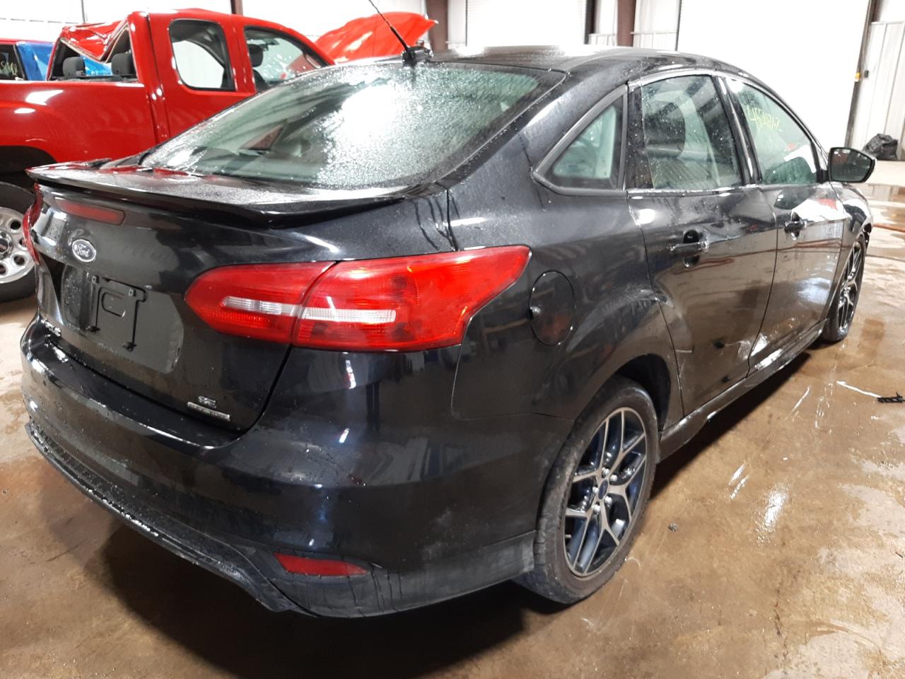 Photo 4 from auction – 2015 FORD FOCUS SE with VIN 1FADP3F22FL235195