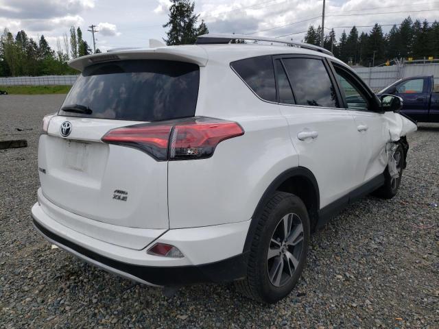 Photo 4 from auction – 2016 TOYOTA RAV4 XLE with VIN 2T3RFREV2GW464430