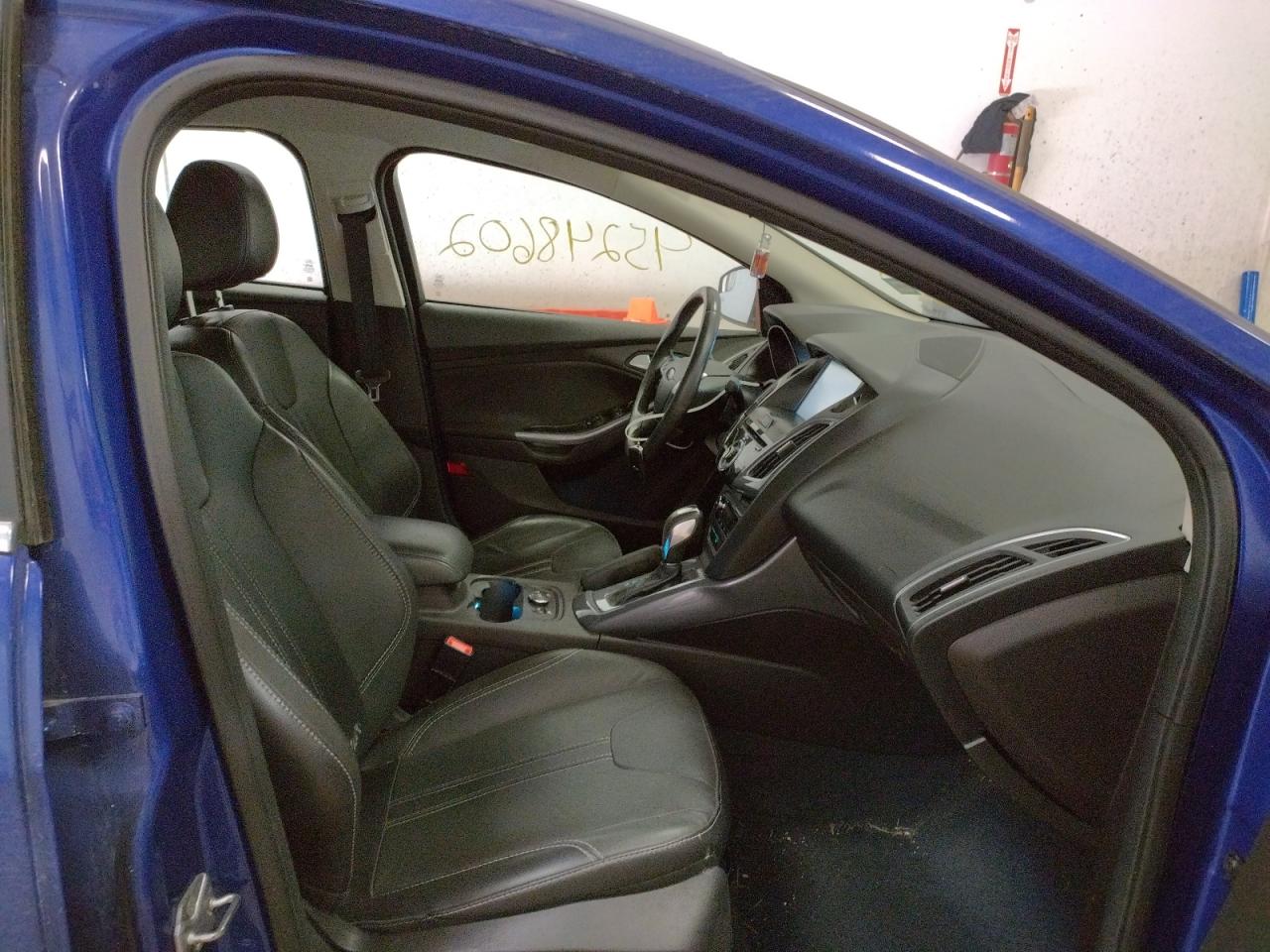 Photo 5 from auction – 2014 FORD FOCUS TITA with VIN 1FADP3J27EL183231