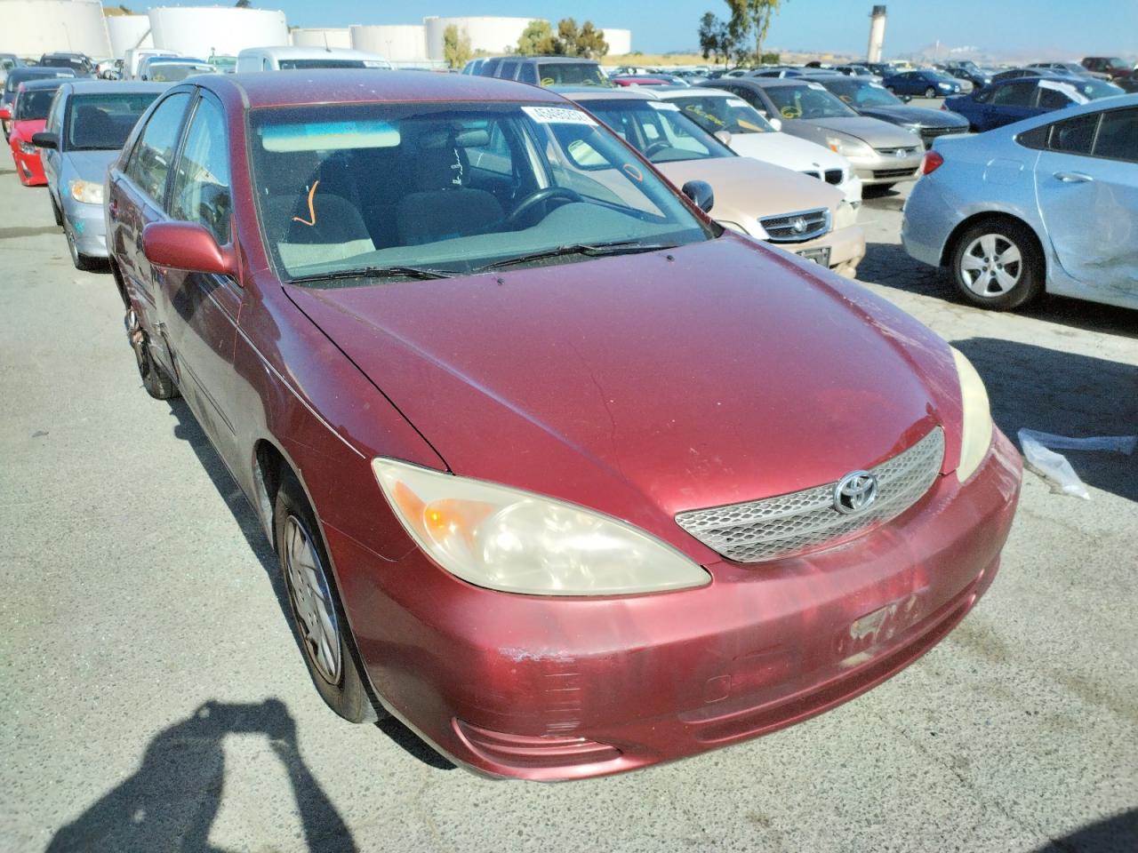 Photo 13 from auction – 2002 TOYOTA CAMRY LE with VIN JTDBE32K920006814