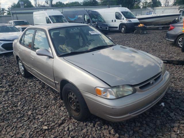 TOYOTA COROLLA 1999 with VIN 2T1BR12E4XC136368 - Photo from auction