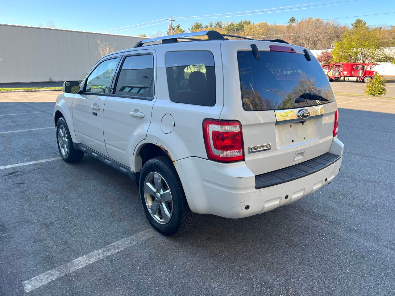 Photo 3 from auction – 2012 FORD ESCAPE LIM with VIN 1FMCU9E7XCKA26413