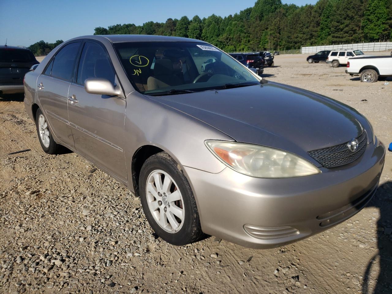 TOYOTA CAMRY LE 2004 with VIN 4T1BF32K44U578362 - Photo from auction