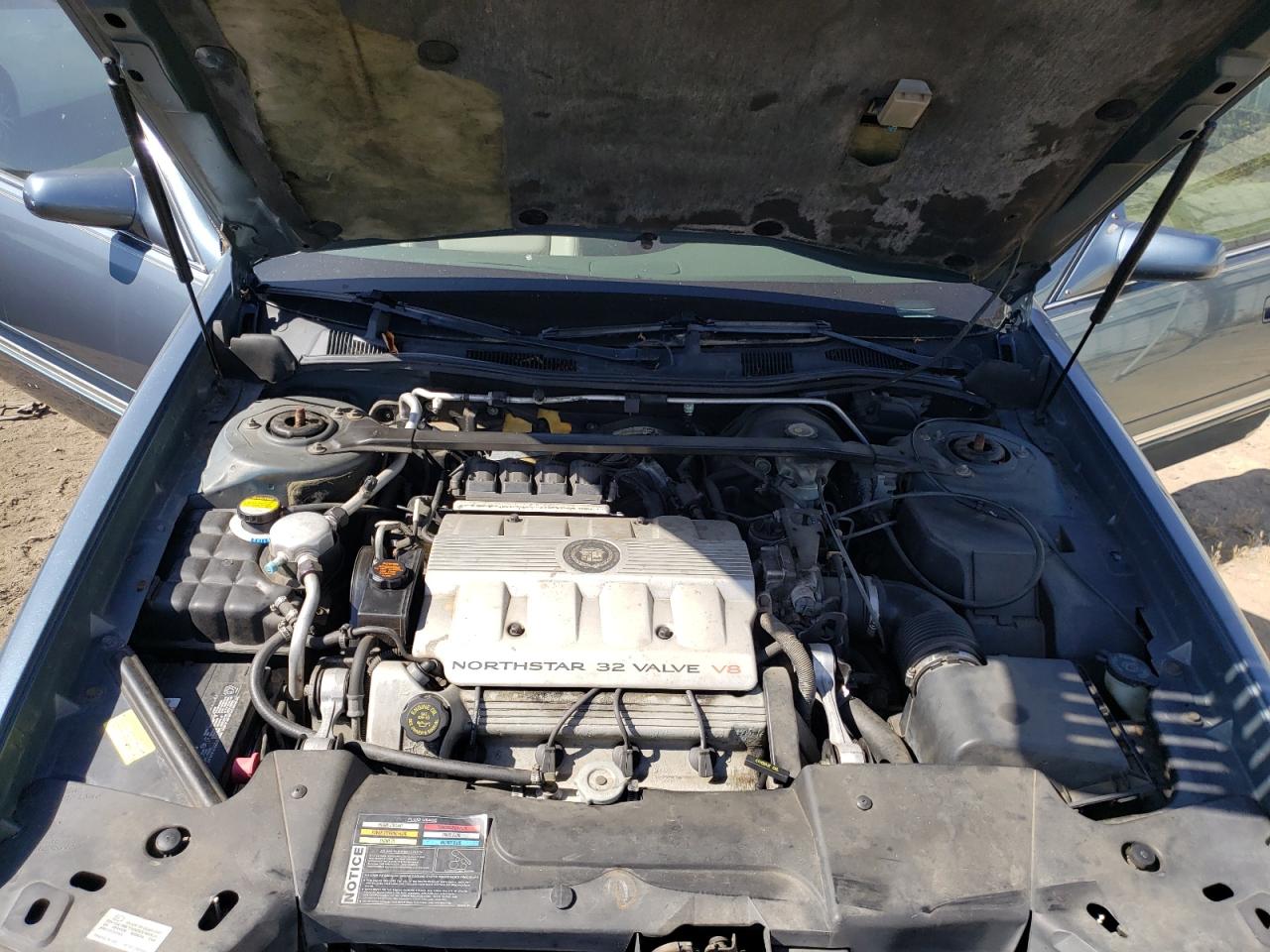 Photo 7 from auction – 1999 CADILLAC DEVILLE with VIN 1G6KD54Y1XU770028