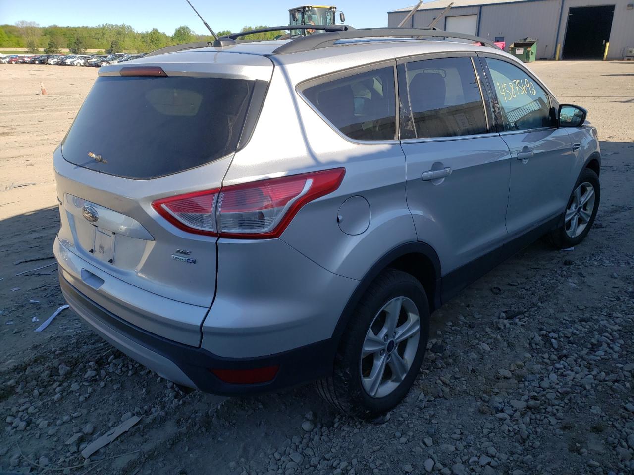 Photo 4 from auction – 2014 FORD ESCAPE SE with VIN 1FMCU9G91EUA39699