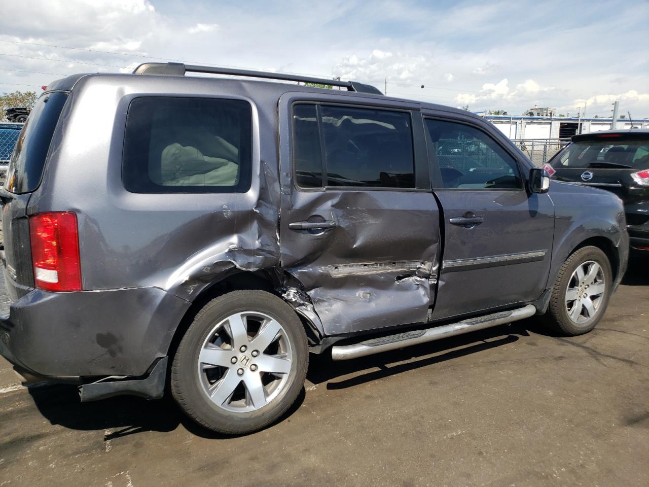 Photo 9 from auction – 2014 HONDA PILOT TOUR with VIN 5FNYF4H92EB022439