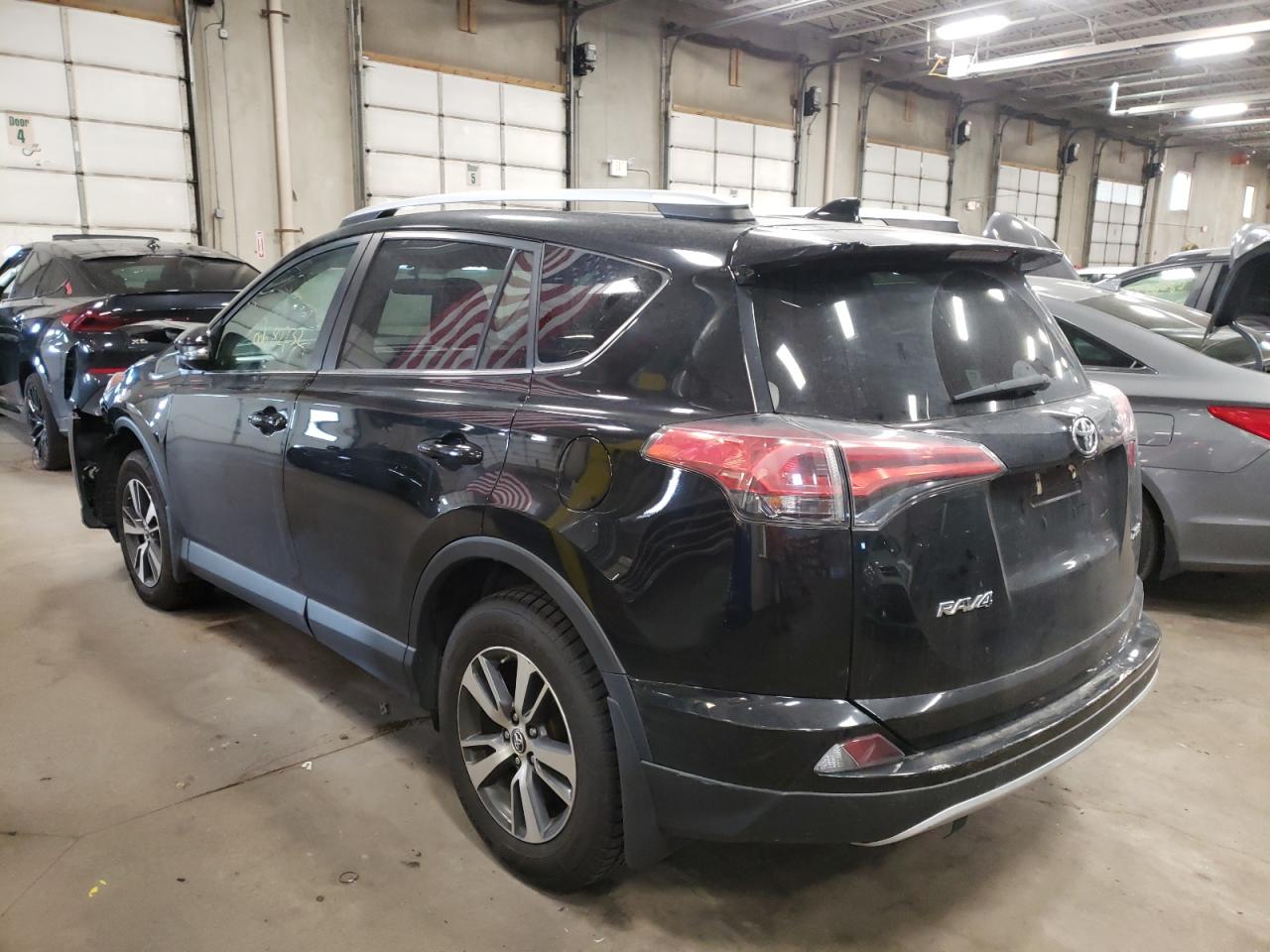 Photo 3 from auction – 2016 TOYOTA RAV4 XLE with VIN 2T3WFREV4GW270260