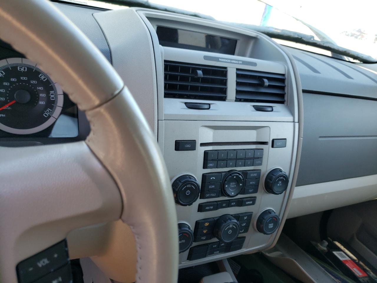 Photo 9 from auction – 2009 FORD ESCAPE LIM with VIN 1FMCU49399KB25663
