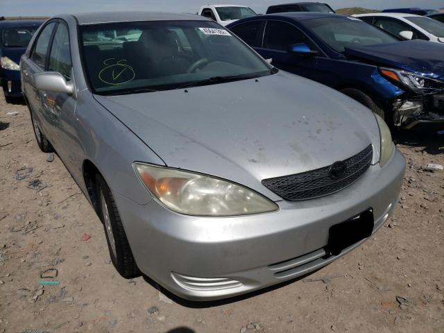TOYOTA CAMRY LE 2003 with VIN 4T1BF32KX3U044006 - Photo from auction