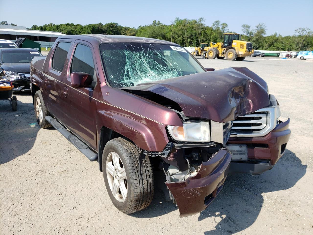 HONDA RIDGELINE 2012 with VIN 5FPYK1F57CB459514 - Photo from auction