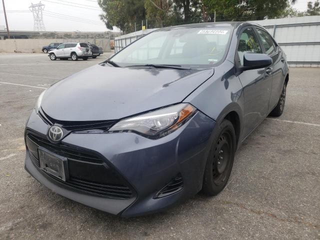 Photo 2 from auction – 2017 TOYOTA COROLLA L with VIN 5YFBURHE8HP670799