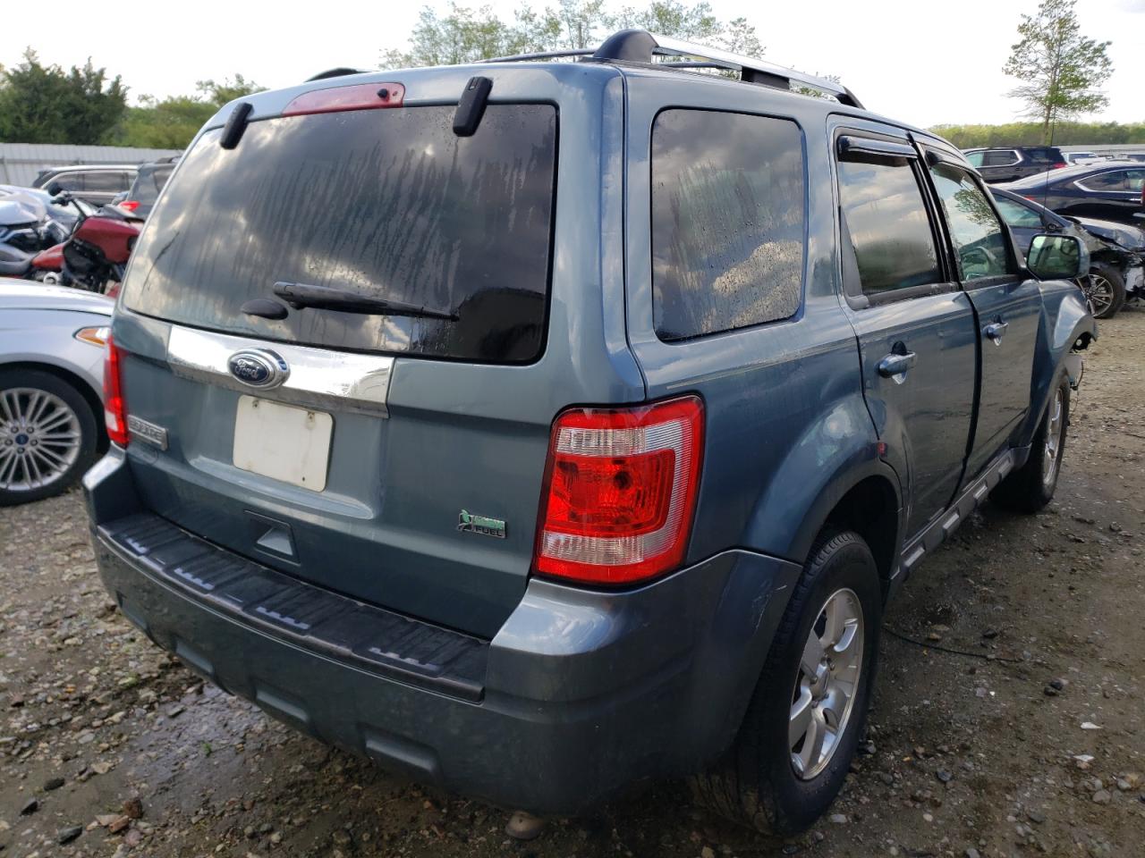 Photo 4 from auction – 2011 FORD ESCAPE LIM with VIN 1FMCU9EG0BKB35770