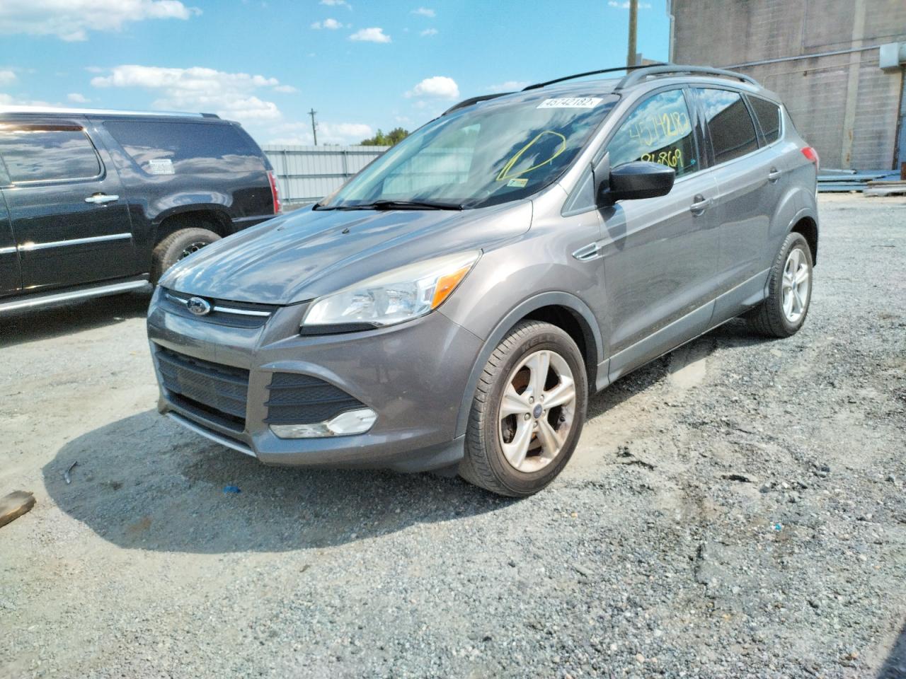 Photo 2 from auction – 2013 FORD ESCAPE SE with VIN 1FMCU0GX4DUB56573