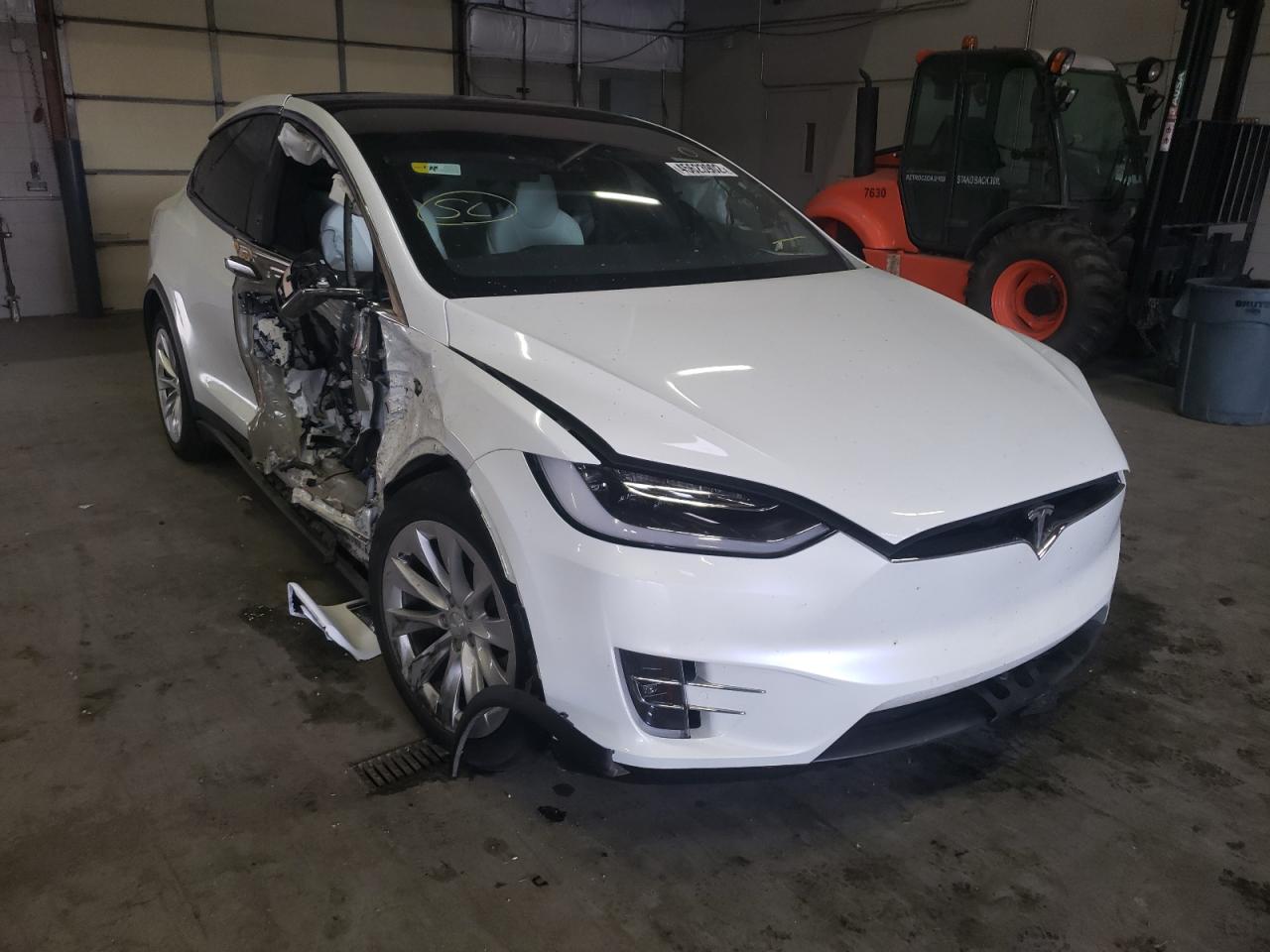 TESLA MODEL X 2018 with VIN 5YJXCAE23JF090642 - Photo from auction