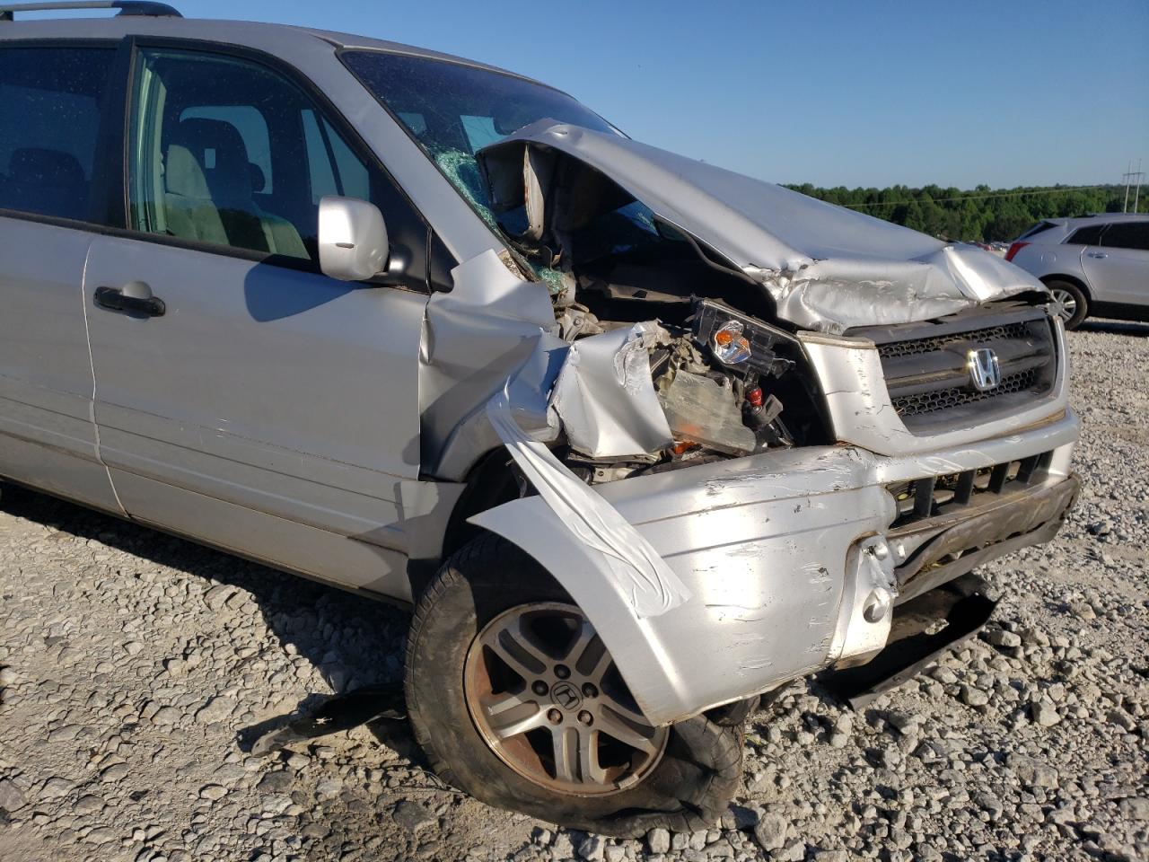Photo 20 from auction – 2004 HONDA PILOT EX with VIN 2HKYF18454H516586
