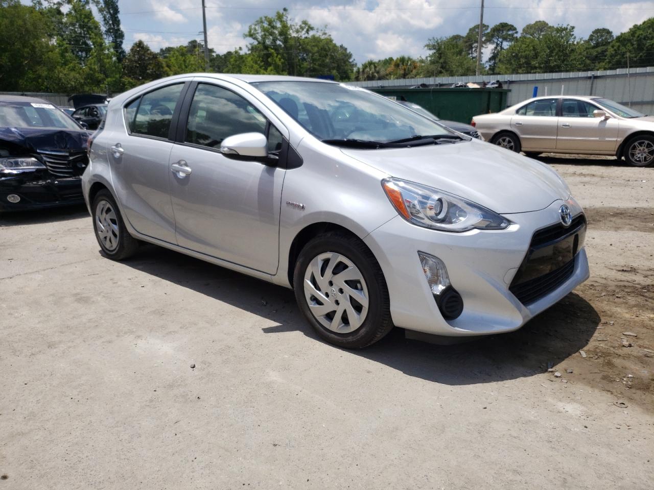 TOYOTA PRIUS C 2015 with VIN JTDKDTB34F1098412 - Photo from auction