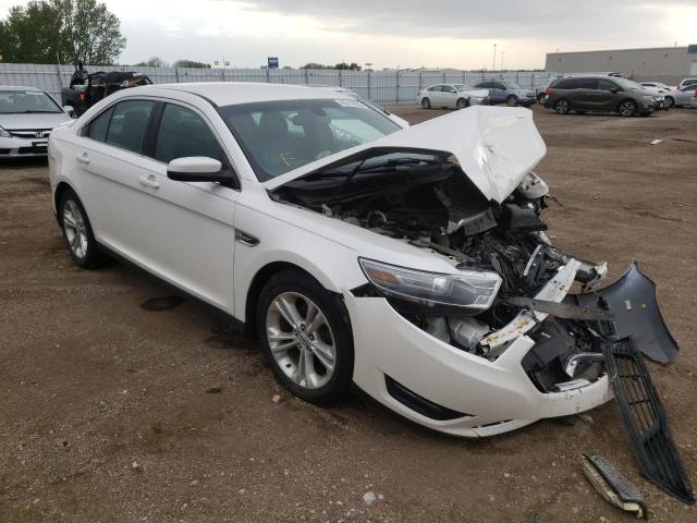 FORD TAURUS SEL 2014 with VIN 1FAHP2E97EG104474 - Photo from auction