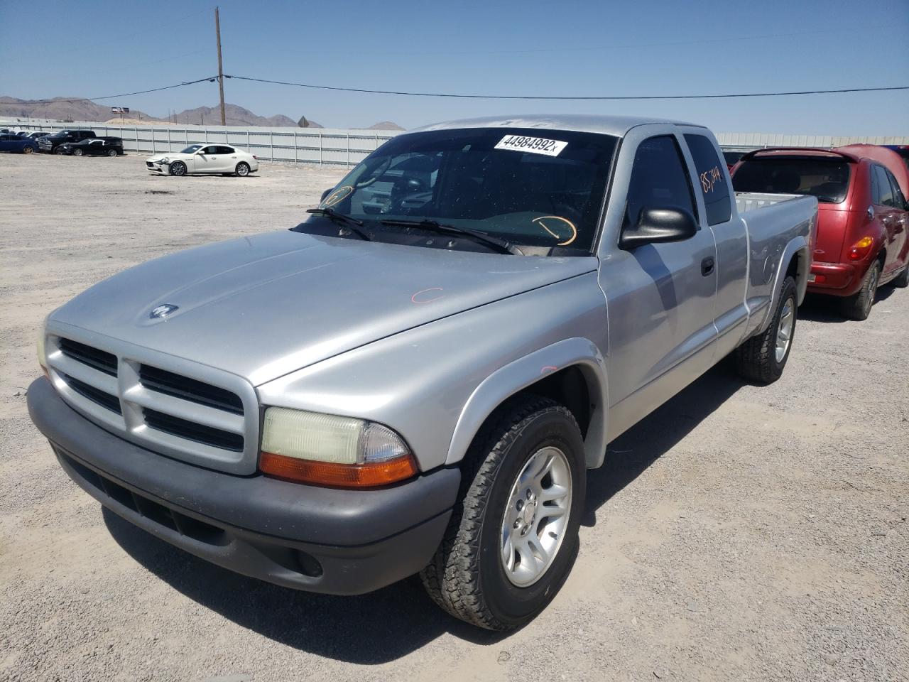 Photo 2 from auction – 2003 DODGE DAKOTA SXT with VIN 1D7HL12X23S140558