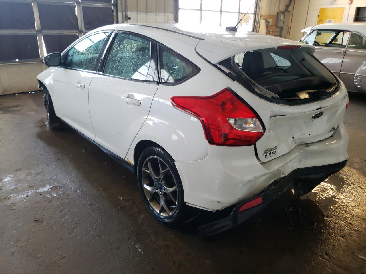 Photo 16 from auction – 2014 FORD FOCUS SE with VIN 1FADP3K23EL318381