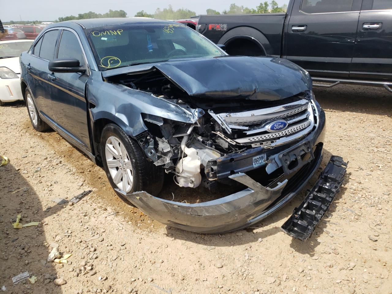 FORD TAURUS SE 2010 with VIN 1FAHP2DW2AG165815 - Photo from auction