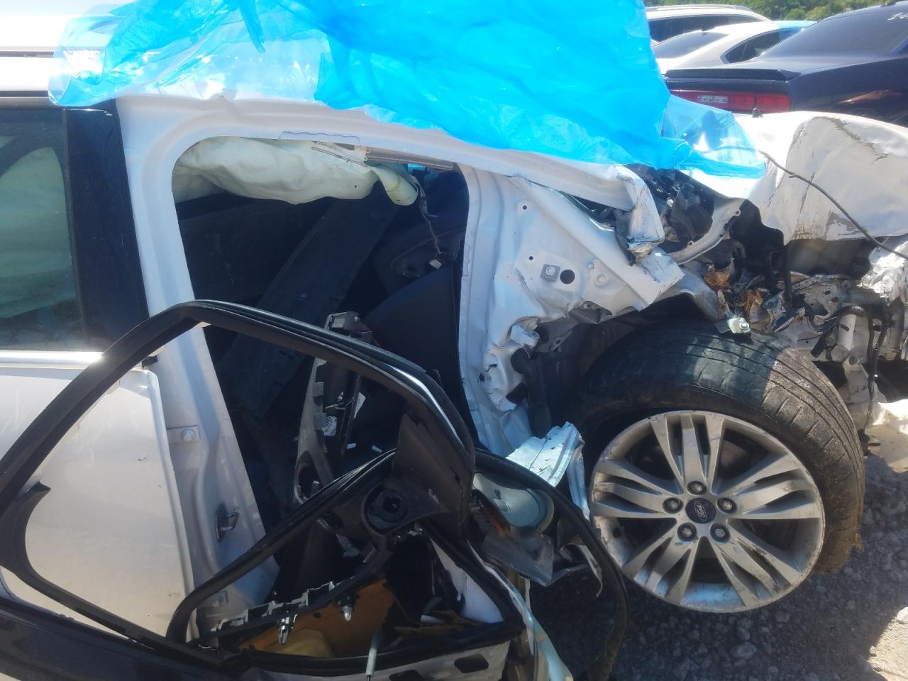 Photo 5 from auction – 2012 FORD FOCUS SEL with VIN 1FAHP3H2XCL367129
