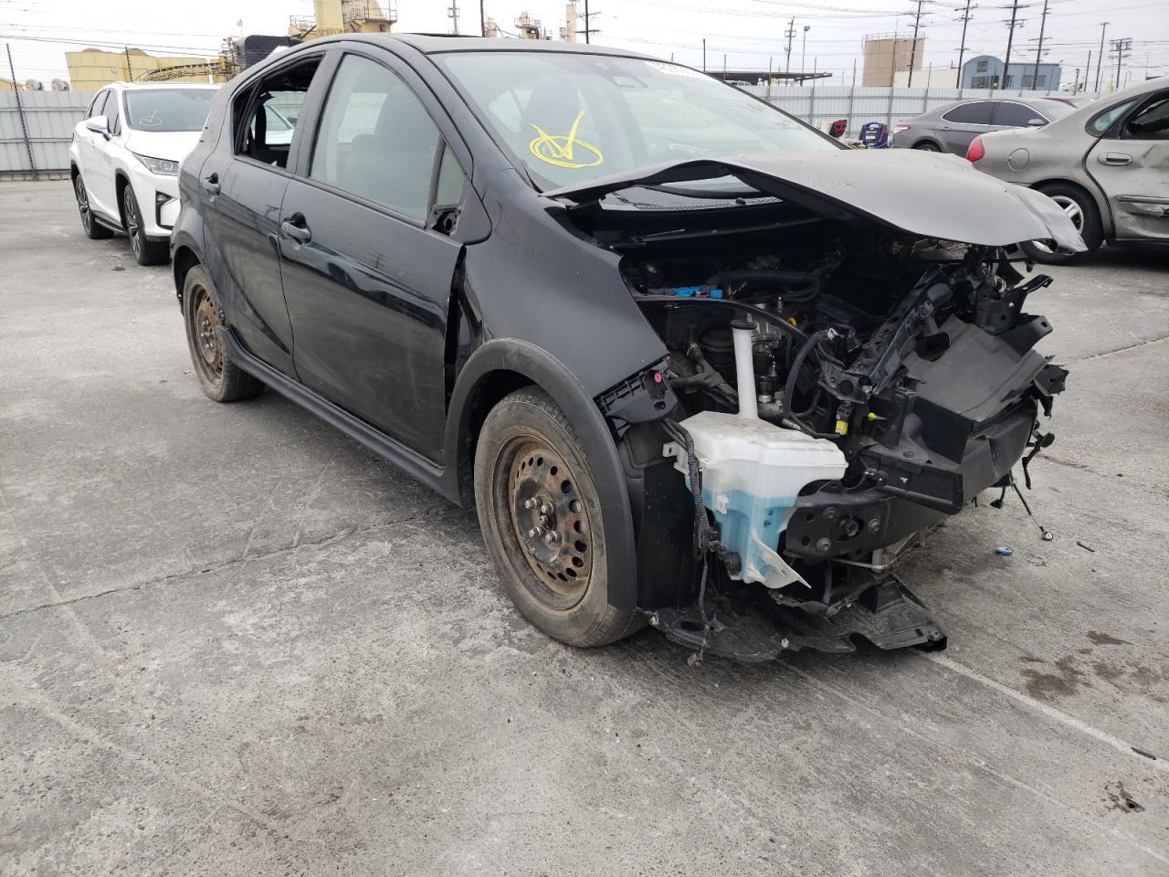 TOYOTA PRIUS C 2018 with VIN JTDKDTB35J1606346 - Photo from auction