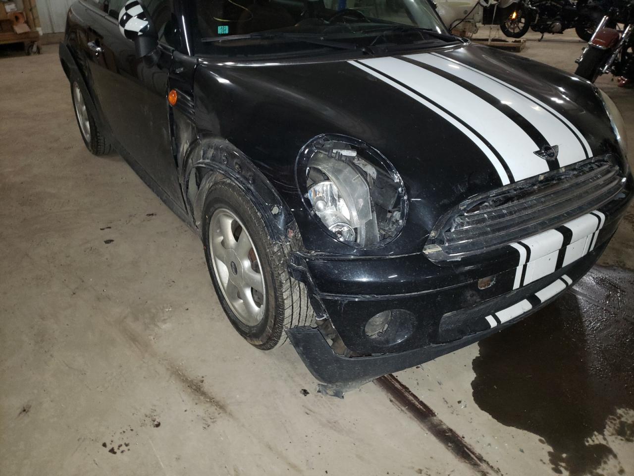 Photo 17 from auction – 2009 MINI COOPER with VIN WMWMF33599TW77159