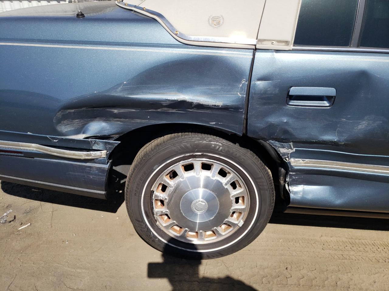 Photo 9 from auction – 1999 CADILLAC DEVILLE with VIN 1G6KD54Y1XU770028