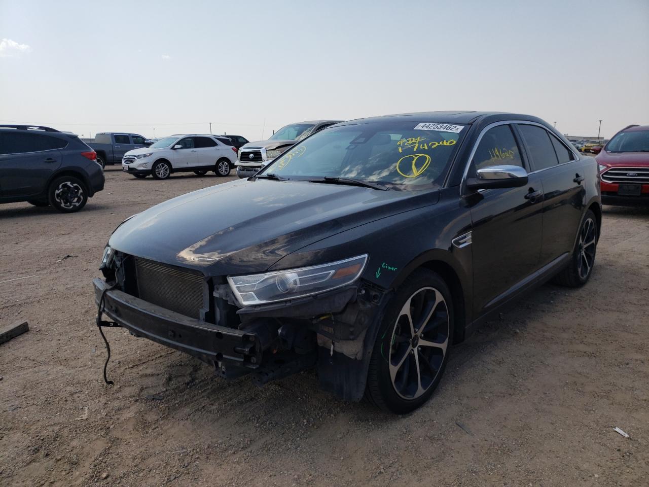Photo 2 from auction – 2014 FORD TAURUS LIM with VIN 1FAHP2F85EG174240