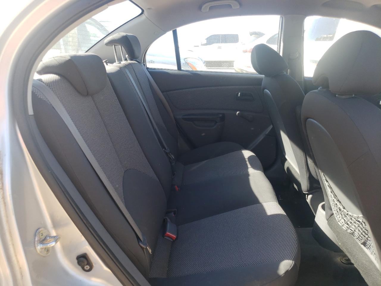 Photo 6 from auction – 2011 KIA RIO BASE with VIN KNADH4A30B6738176