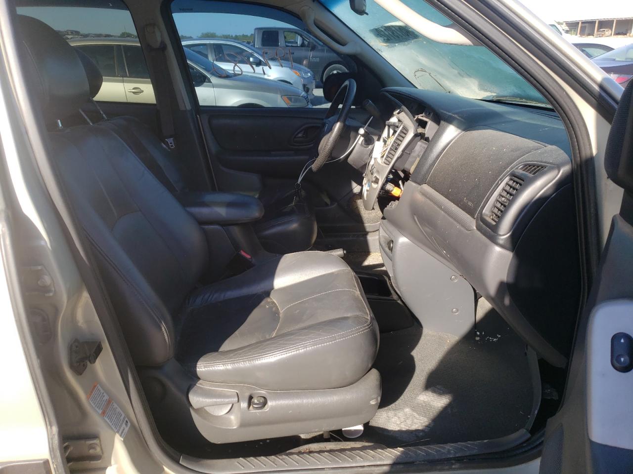 Photo 5 from auction – 2004 MAZDA TRIBUTE ES with VIN 4F2CZ96194KM24567