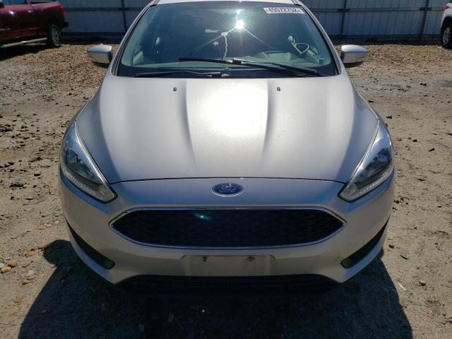 Foto 9 de la subasta – 2015 FORD FOCUS SE con VIN 1FADP3K25FL382259