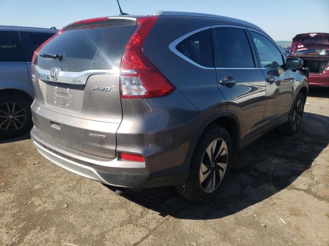 Photo 4 from auction – 2016 HONDA CR-V TOURI with VIN 5J6RM4H94GL065121