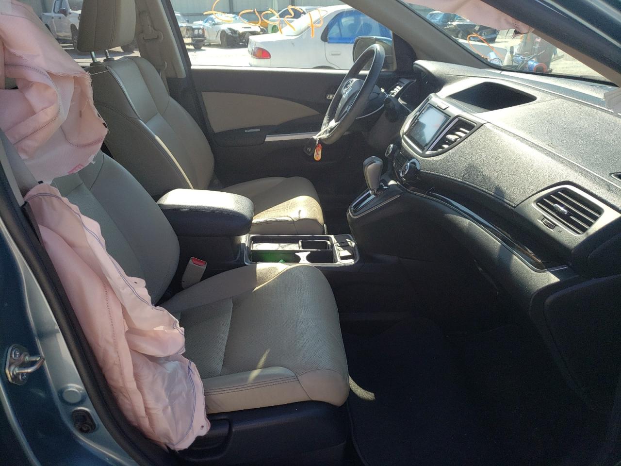 Photo 17 from auction – 2016 HONDA CR-V EXL with VIN 2HKRM4H79GH667621