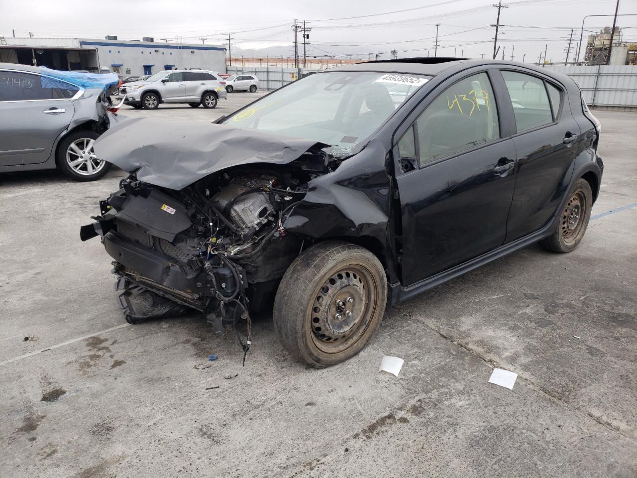 Photo 2 from auction – 2018 TOYOTA PRIUS C with VIN JTDKDTB35J1606346