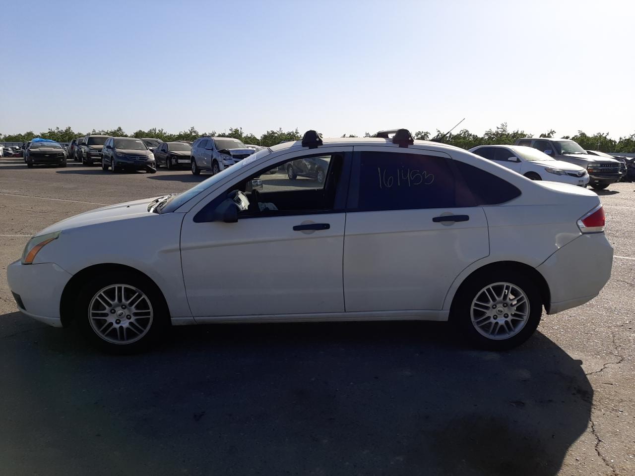 Photo 9 from auction – 2011 FORD FOCUS SE with VIN 1FAHP3FN2BW120827