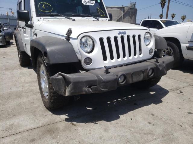 Photo 9 from auction – 2015 JEEP WRANGLER U with VIN 1C4HJWDG4FL657160